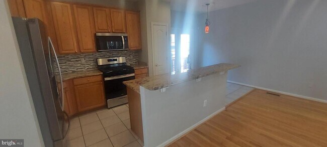 Building Photo - 10210 Sherman Heights Pl