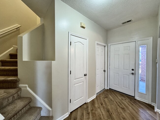 Building Photo - Ready NOW!! A 3-Bedroom Townhome w/Attache...