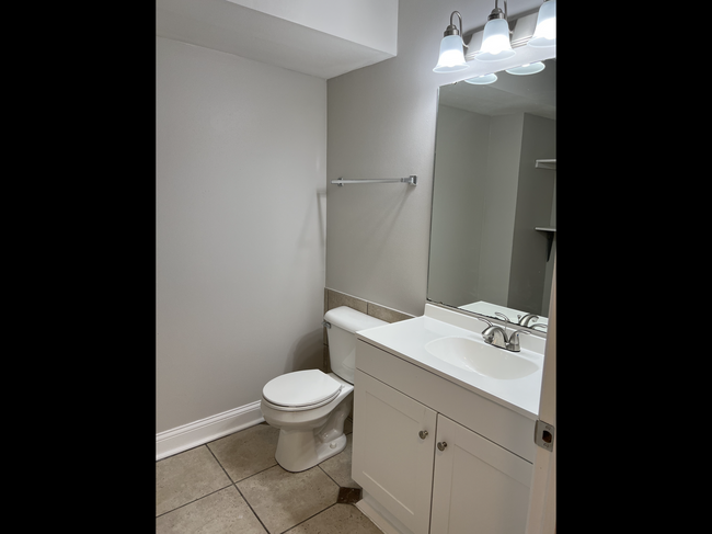 Powder room - 4601 52nd Ave