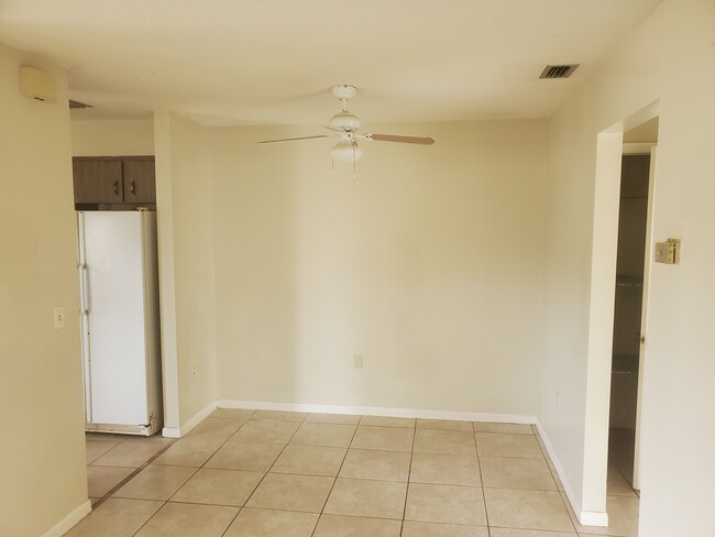 Dining area with entry to kitchen - 6538 W Norvell Bryant Hwy