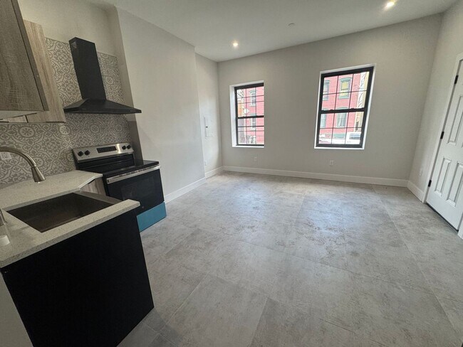 Primary Photo - Real Estate Listing: Newly Renovated 2-Bed...