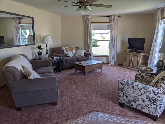 Living room with wood stove - 1012 3rd St