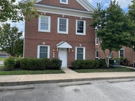 Summer Exterior - Courtyard Village Apartments