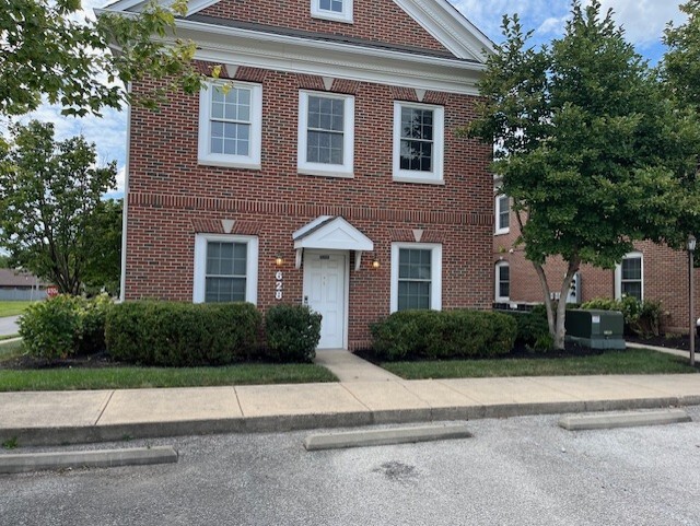 Summer Exterior - Courtyard Village Apartments