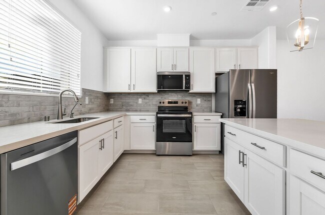 Building Photo - Modern Cadence Townhome with Open-Concept Living & Energy-Efficient Features!