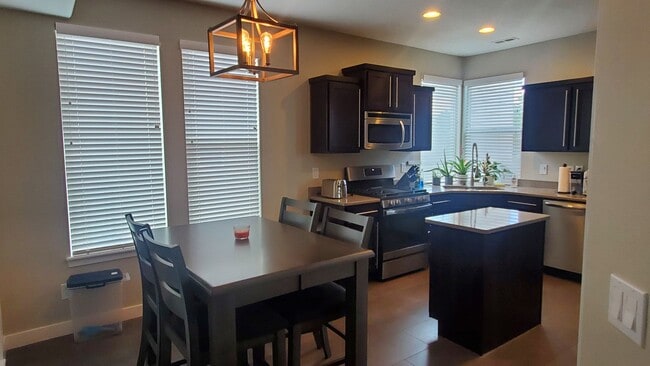 Building Photo - 2 Master Suites Townhome 2 Car Garage