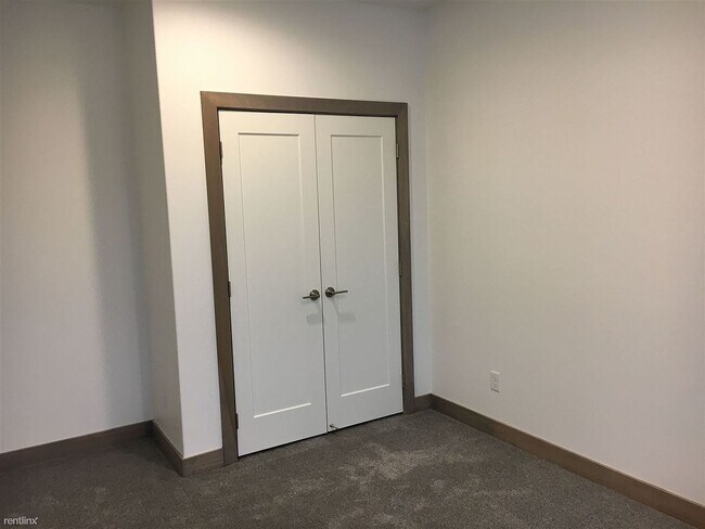 Building Photo - Spacious 4 bedroom/3 bath home with finished lower level and attached 2 car garage