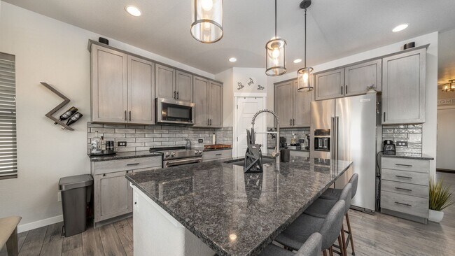 Building Photo - Four Bedroom Rancher in Greenways at Sand Creek