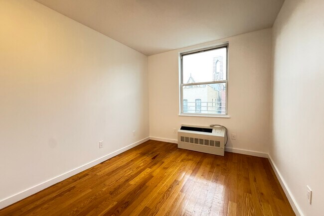 Building Photo - 51 E 128th St