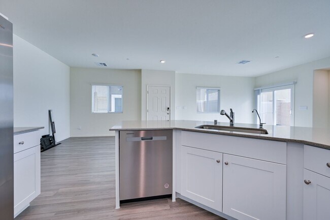 Building Photo - NW 3 Bedroom Townhouse!! Gated Community Pool!! 2 Car Garage!!! No Carpet downstairs.