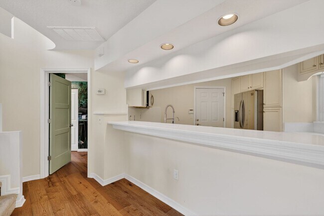 Building Photo - Available Now! Waterfront Living at Its Best – Pool, Decks & Gated Privacy