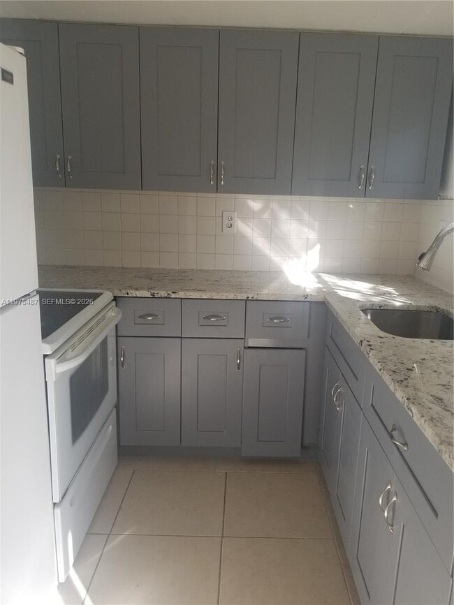 Building Photo - 3090 Coral Springs Dr