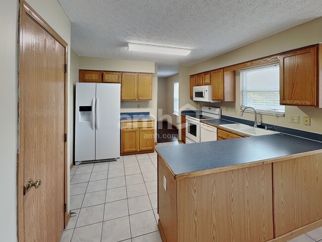 Building Photo - 7908 Windrift Pl