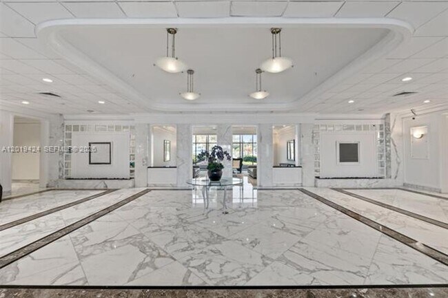 Building Photo - 5700 Collins Ave