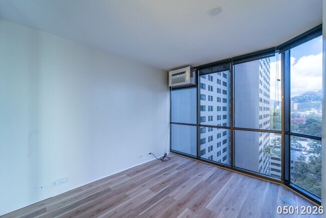 Building Photo - Luxury 1-Bedroom Condo with Stunning Mountain Views