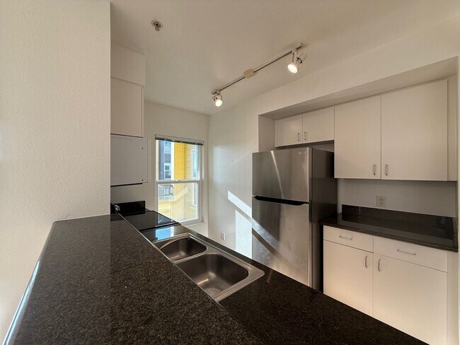 Building Photo - 2 Bedrooms / 2 Bathrooms – Corner Unit at Ocean Village Plaza