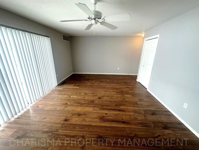 Building Photo - WALK IN LEVEL 2 BD, 1 BA CONDO WITH WOOD F...