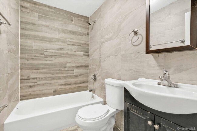 Building Photo - 228-07 146th Ave