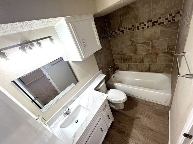 Building Photo - **BEAUTIFUL WHISPERWOOD COMMUNITY CONDO**