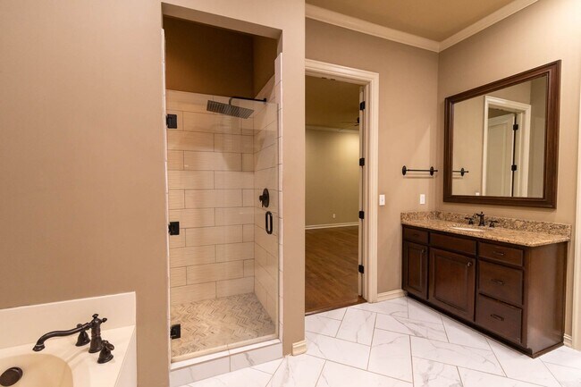 Building Photo - Rare lease opportunity in the exclusive ga...