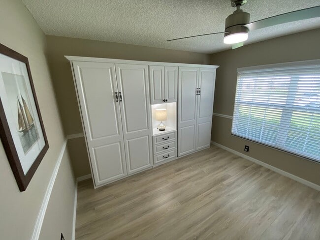 Building Photo - Gorgeous 3 + 2 Turnkey ANNUAL Lease w/Swim Spa & Large Private Screened in Patio In The Village o...