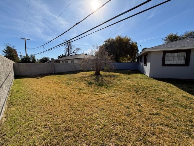 Building Photo - Spacious 4 Bed 3 Bath Single-Level Home | RV Gate | Huge Yard | Bright Open Layout