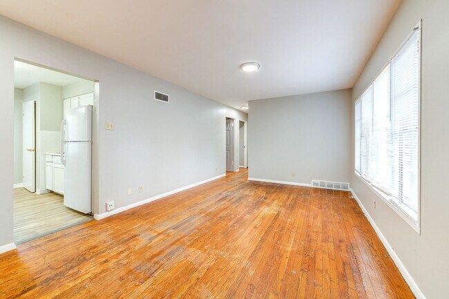 Building Photo - Charming Mid-Century Home with Basement and Fenced Backyard!