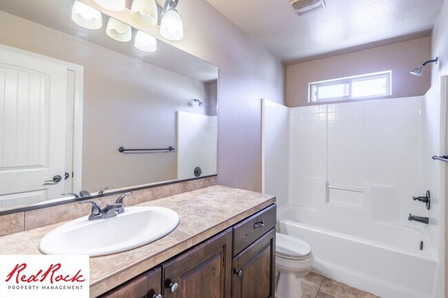 Building Photo - Dog Friendly, Pleasant 4 Bedroom, 2.5 Bathroom Townhome