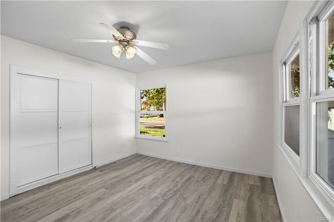 Building Photo - Welcome to this inviting 3 bedroom, 2 bath residence tucked away on a peaceful street in the hear...