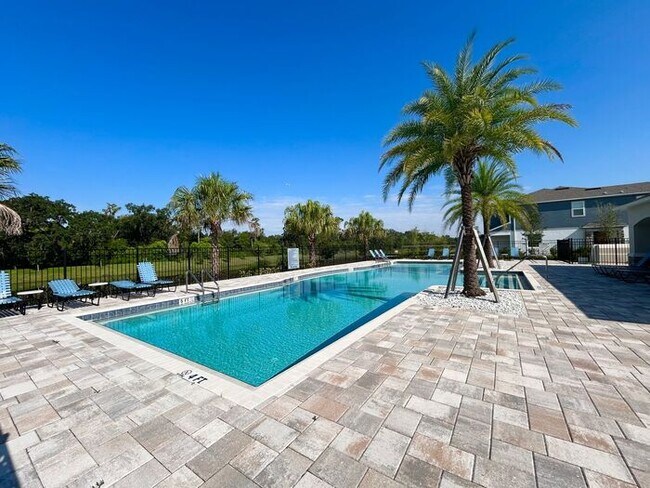 Building Photo - Brand-New 3/3 Modern Townhome in Gated Tys...