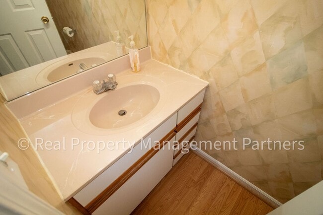 Building Photo - Forest Hills 3 Bed Townhome with Garage, Pond View and Some Utilities Included