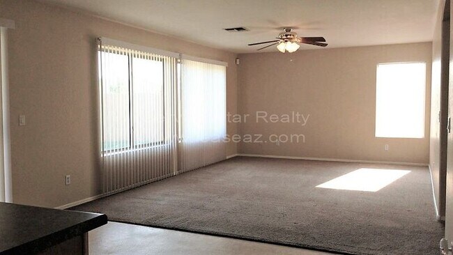 Building Photo - 3201 N 127th Dr