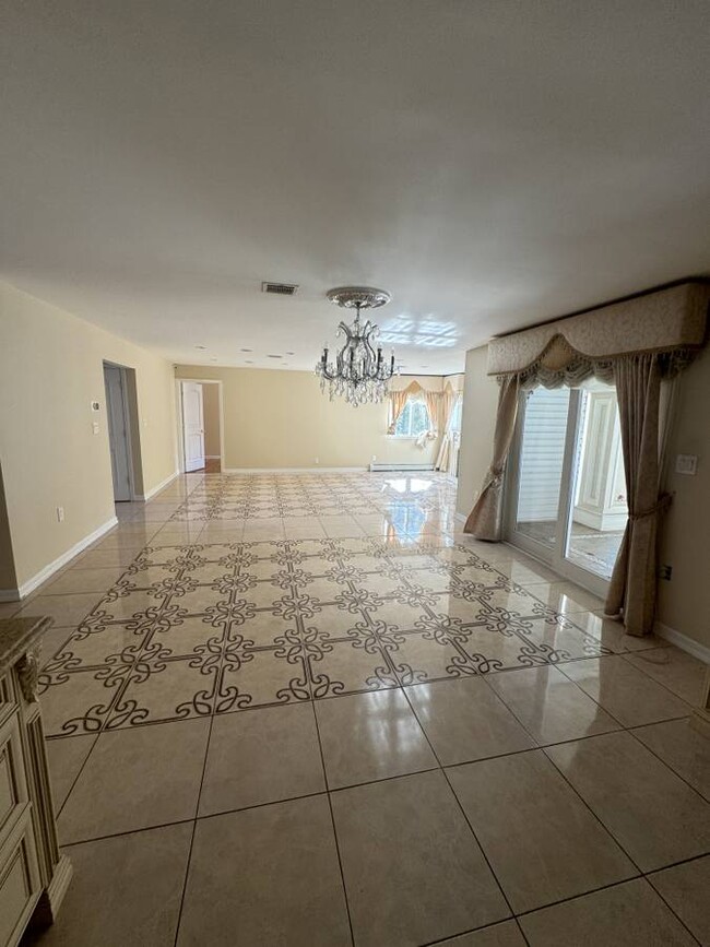 Breakfast area and family room - 1 Wiltshire Dr