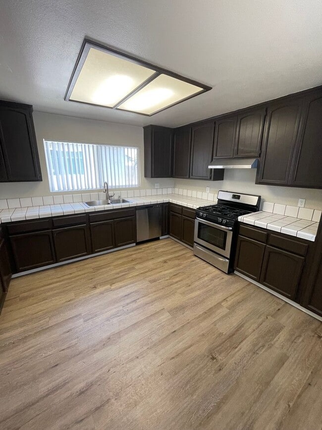 Building Photo - Spacious 4BR Cul-de-Sac Home with Large Backyard & Attached Garage