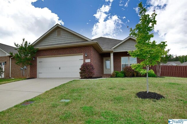 Building Photo - SPACIOUS FOUR BEDROOM BRICK HOME