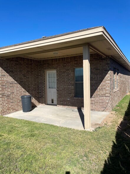 back patio (new backdoor w/o doggie door has been installed) - 404 E 19th St