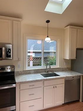 Building Photo - Bright, Modern, and Move-In Ready – Your P...