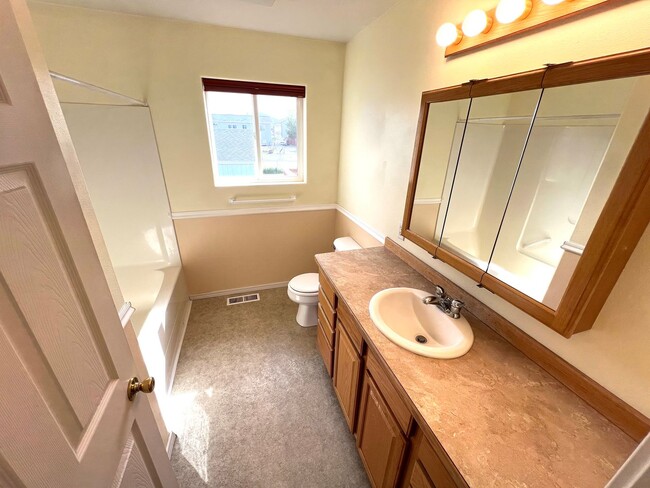 Building Photo - Pet Friendly 4 Bed 2 Bath Single Family Home W/ Fully Fenced Yard, Double Car Garage Located in E...
