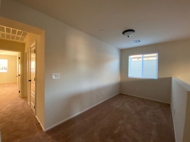 Building Photo - 4 BED 3 BATH Townhome, 1 LOFT, 2 GARAGES, GATED!