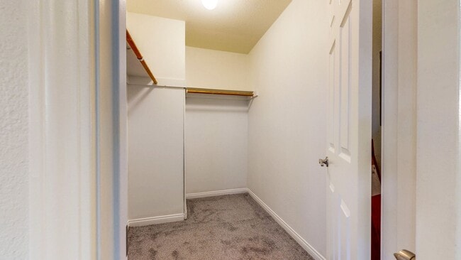 Building Photo - Cozy 1 bedroom 1 bath end unit condo with 1 car garage and private patio located next to Peterson...