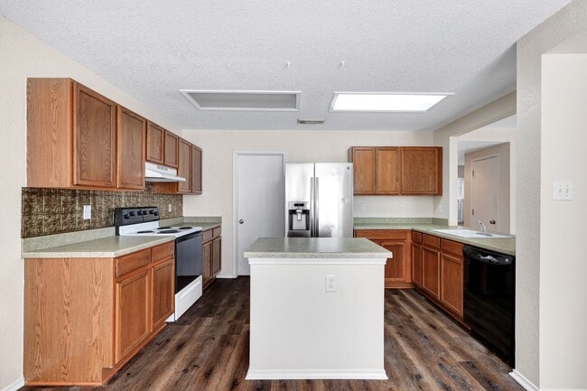 Building Photo - Spacious Brick-Front Home with Loft and Ex...