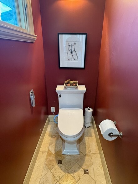 Primary suite:Bathroom features heated floors, towel warmer, and an auto-bidet for ultimate comfort - 115 Inez Pl