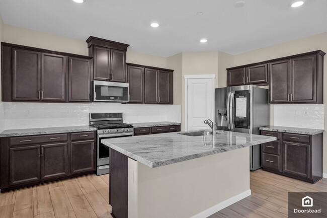 Building Photo - 5587 Saddle Rock Ln