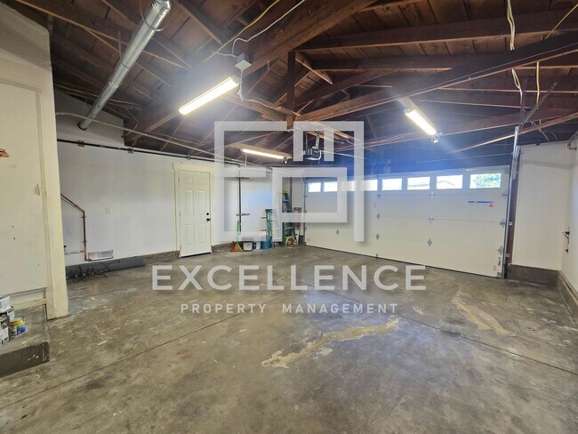 Building Photo - All Newly Remodeled Throughout Home With Huge Yard
