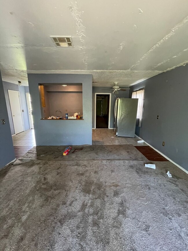 Building Photo - 3BD Home needing some TLC!! Has Fenced in Backyard & a 2-Car Garage!!