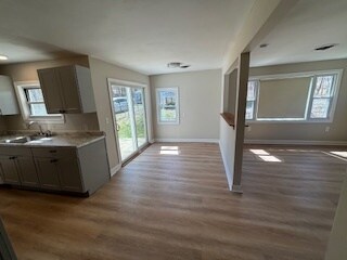 Open concept kitchen, dining, and living areas - 64 Laurel Trl
