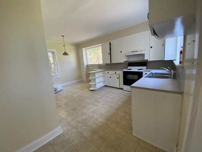 Building Photo - Lawn Care Included!!