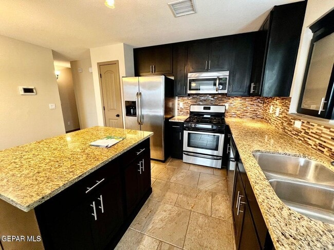 Building Photo - 12777 Tre Maximiliano Ave