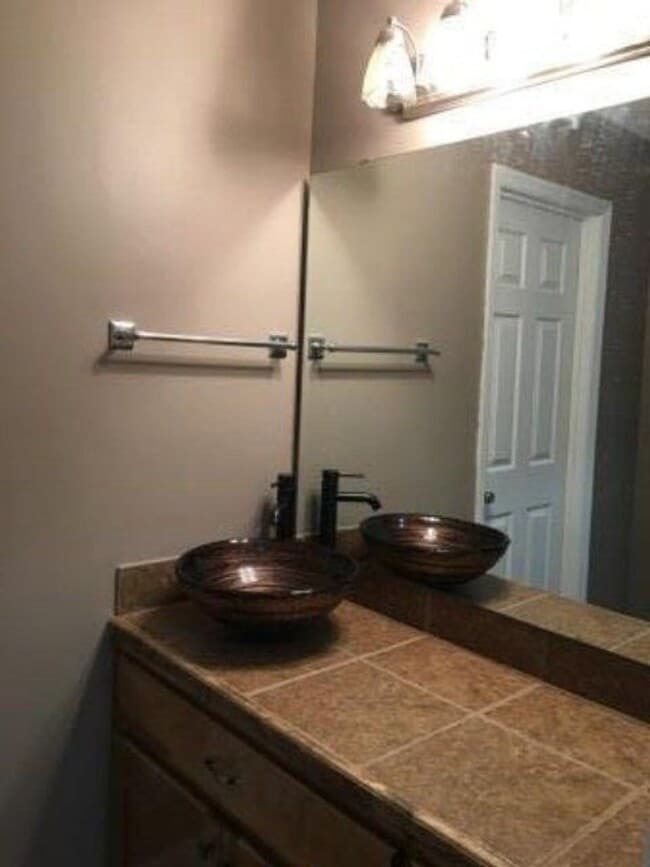 Building Photo - Spacious 3BR Brick Home with Open Split Floor Plan & Tiled Back Porch on Nearly an Acre