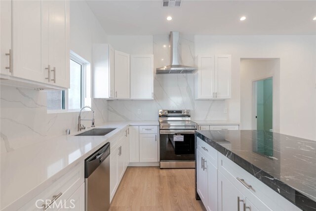 Building Photo - 6852 Ranchito Ave